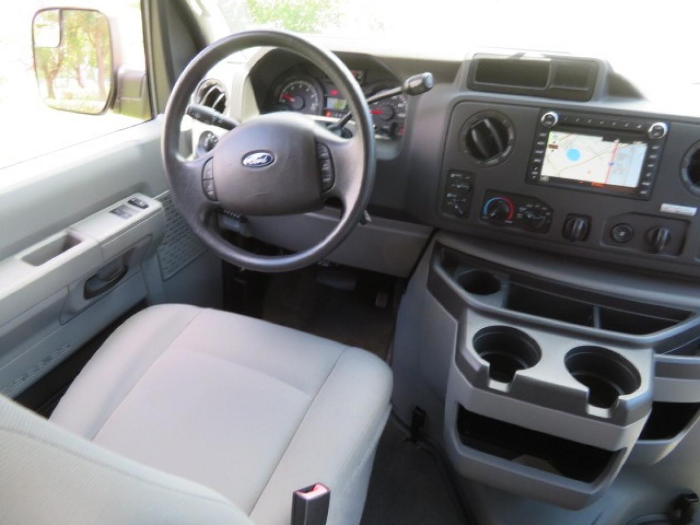 2013 Dark Blue /Gray Ford E-Series Wagon XLT (1FMNE1BW4DD) with an 4.6L V8 engine, Automatic transmission, located at 4301 Oak Circle #19, Boca Raton, FL, 33431, (954) 561-2499, 26.388861, -80.084038 - You are looking at a Gorgeous 2013 Ford E150 XLT Handicap Wheelchair Conversion Van with 22K Original Miles, Tie Down System, Power Electric VMI Side Entry Wheelchair Lift, Back Up Camera, Factory Navigation and Much Much More. This van is Awesome. This is a Nice Rust Free Van with a Clean Carfax, C - Photo#63